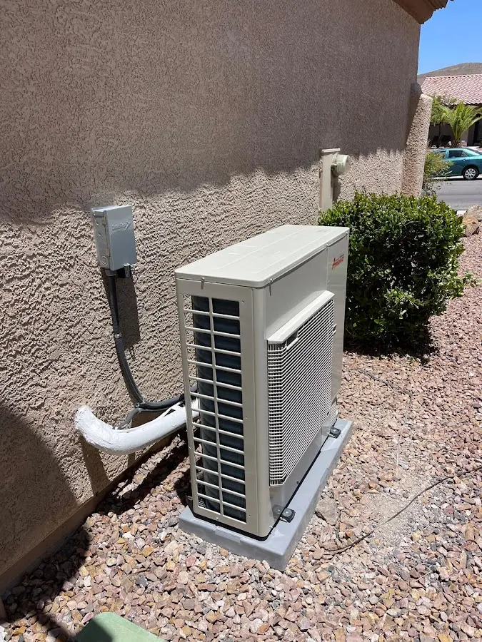 Residential air conditioning condenser unit in Oakdale